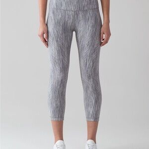 Lululemon Wunder Undecrop High Rise 21” Luon Arrow Jaquard Silver leggings 6